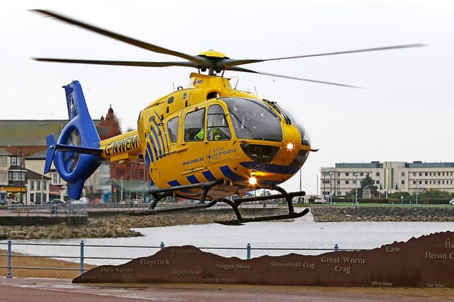 Air Ambulance landed on carriageway to airlift patient to hospital.