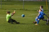 Under-7s' football action. Lytham Junior Blues v Foxhall JFC at Ballam Road