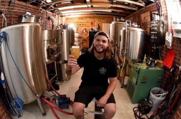 Ryan Hayes in his garage brewery