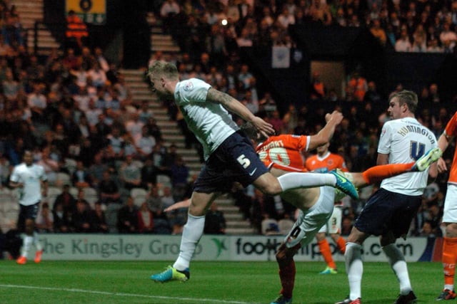 Tom Clarke heads home against Blackpool in August 2013