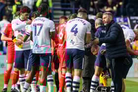 Preston North End manager Ryan Lowe gives instructions to his team during a break in play