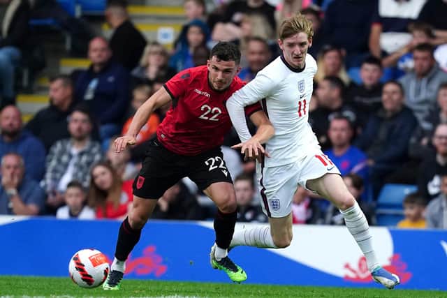 England's Anthony Gordon (right) battles with Albania's Albion Marku