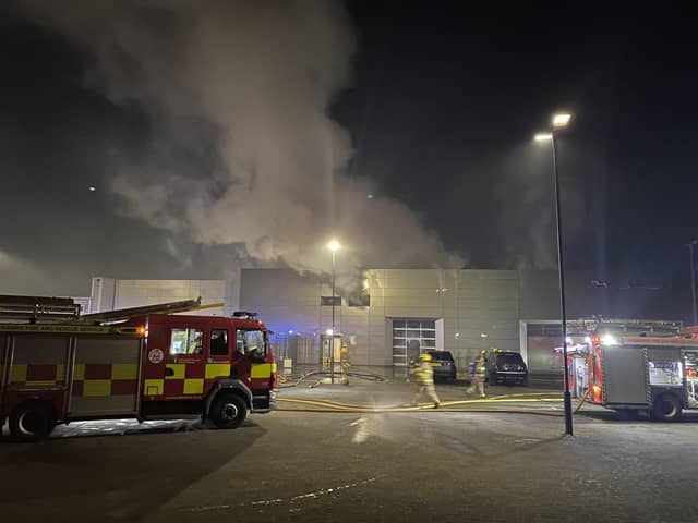 An investigation has been launched into the cause of a car dealership fire in Preston (Credit: @LancashireFRS)