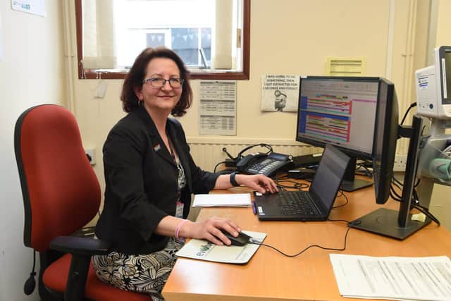 Dorota Matuszewska, originally from Poland, is the Assistant Clinical Applications Training Manager for Lancashire Teaching Hospital's Trust; she is pictured at her office in Royal Preston Hospital.