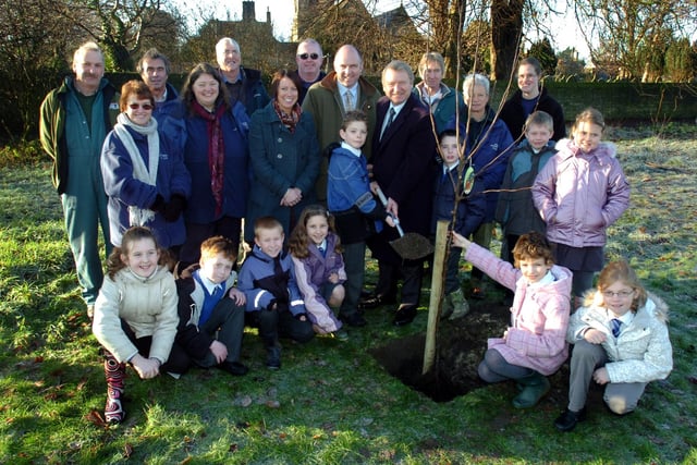 Head teacher Cathryn Wilkinson with children at SS Mary and Michael School, Garstang, welcome Tom Pridmore, Coun Russell Forsyth, and voluntary rangers to the tree planting at the school