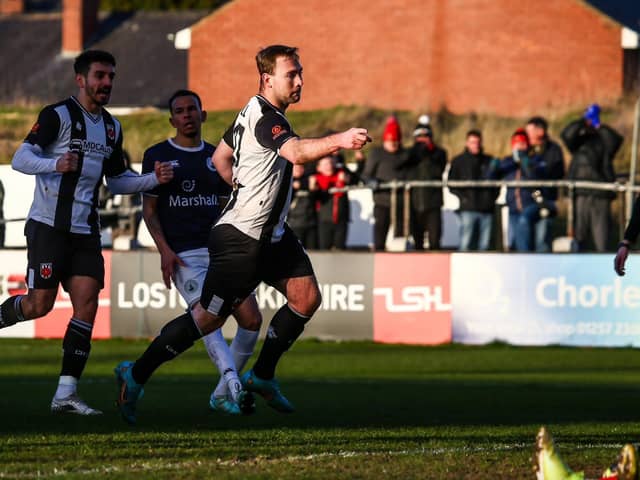 Connor Hall celebrates after scoring from the spot (photo: Stefan Willoughby)