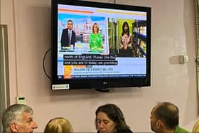 Staff at the Intact Centre watch the TV broadcast on GMB (Image: Intact Centre).