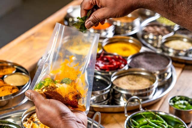 Authentic curries from Rafi's Spicebox available at Booths