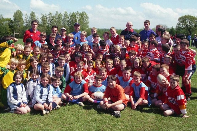 Leyland Warriors hosted a rugby league tournament with 10 secondary schools taking part. It was the second year Warriors have run this event in an endeavour to promote the game in the area and to encourage teachers to include it on the school sports timetable. Pictured: The young competitors and coaches at the Warriors' junior event take a well-earned breather