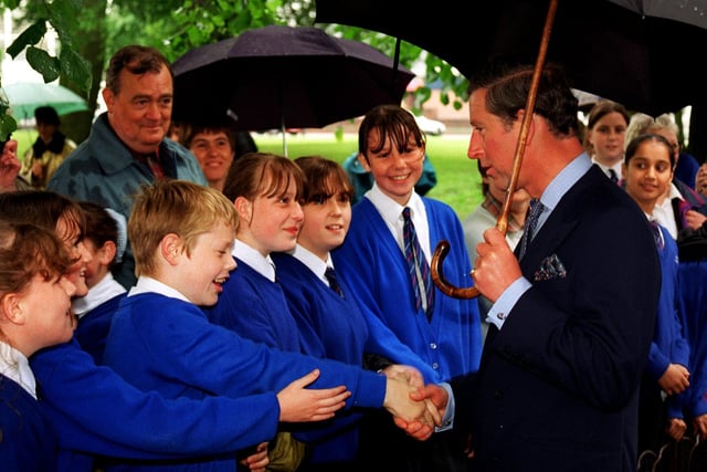 Prince Charles chats with pupils at Moor Park High School 1997