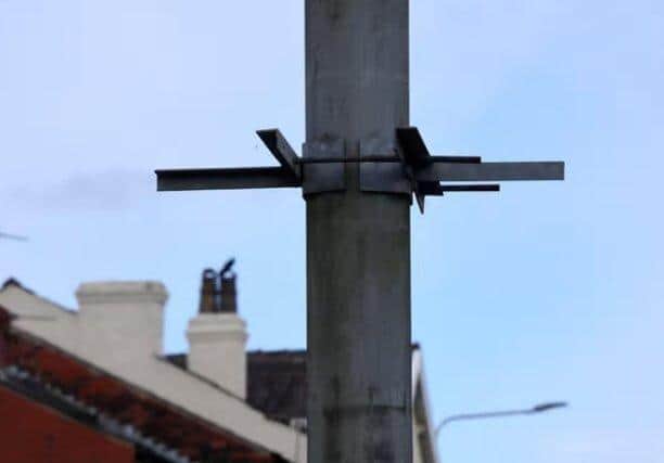 It was feared that many of Lancashire's lampposts could be be left bereft of hanging baskets in summer and bunting at Christmastime