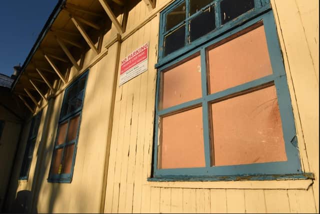 The windows are boarded up as the weather takes its toll.