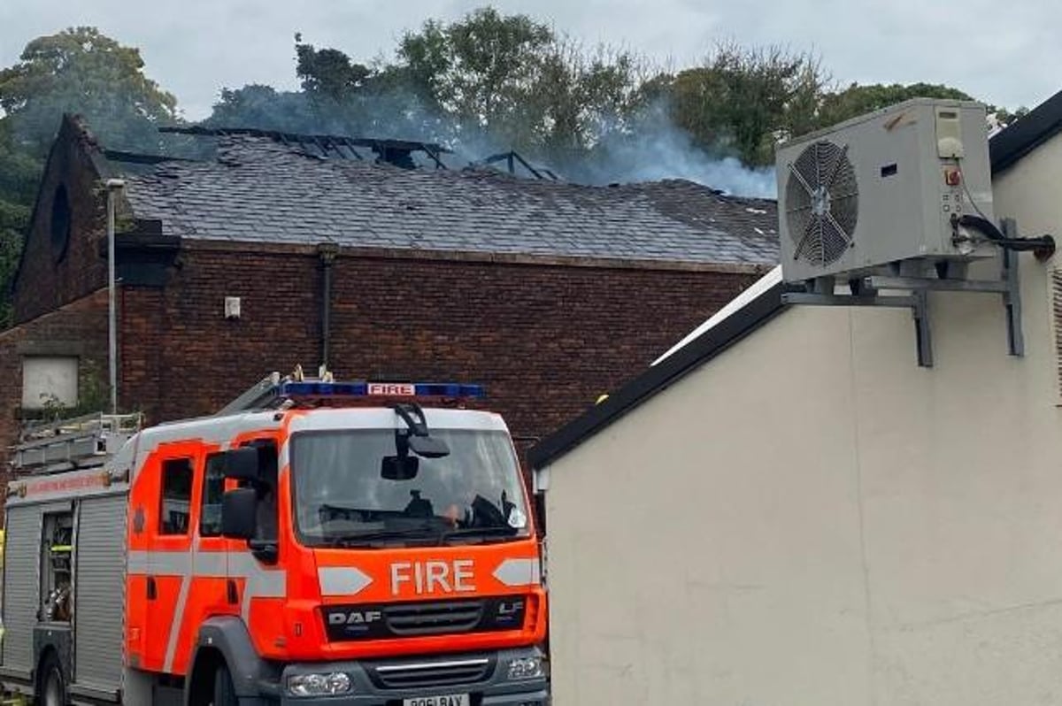 Fire crews attend commercial building blaze amid fears over gas explosion