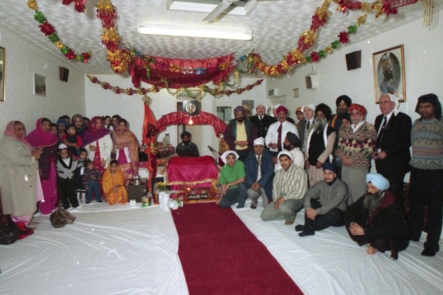 Preston's Sikh community is enjoying a traditional religious celebration. The community is putting on a festival to mark the birthday of the last of the religion's 10 gurus, Gobind Singh Ji. It involves the community's spiritual leaders reading the Granth, the Sikh holy book, without a break for 48 hours. Pictured: Guests join Preston's Sikh community for a colourful festival opening 