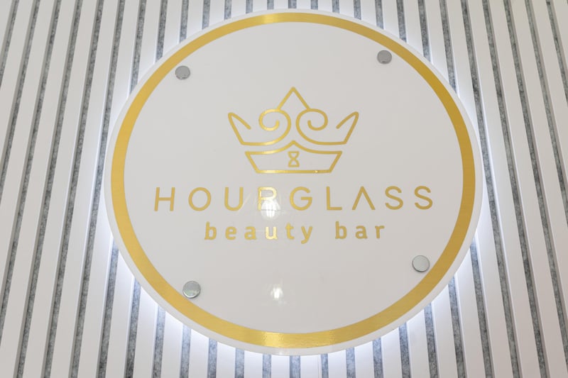 The Hourglass Beauty Bar symbol embodies the feminine figure