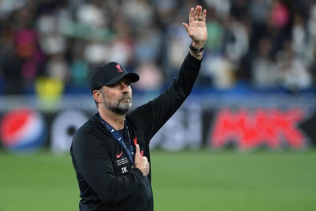 Liverpool manager Jurgen Klopp salutes the travelling fans after the final whistle