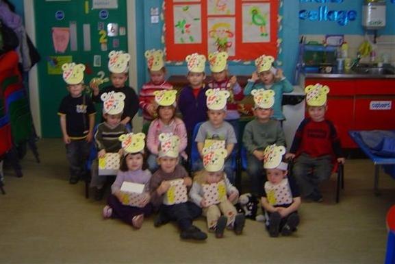 Youngsters from the Rainbow Pre-School in Garstang pictured wearing Pudsey Bear hats which they made. The group also sold lots of home made cakes, biscuits and chocolates to raise money for Children in Need