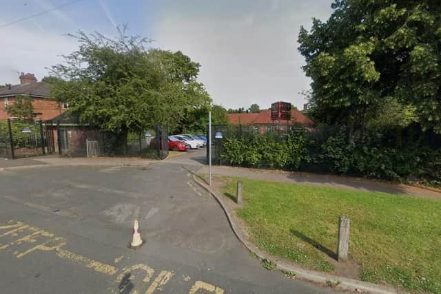 A man was spotted "brandishing a machete" outside Holme Slack Community Primary School in Manor House Lane (Credit: Google)