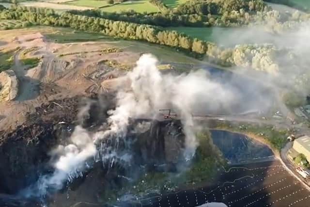 Drone footage released by Lancashire Fire and Rescue Service showed the extent of the blaze at Clayton Hall landfill site in Buckshaw Village (Credit: @LFRSDrone)