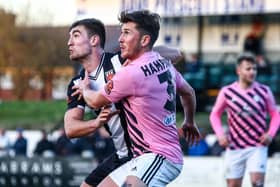 Harvey Smith defends for Chorley against Curzon Ashton (photo: Stefan Willoughby)