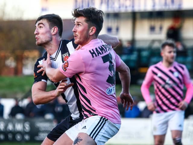 Harvey Smith defends for Chorley against Curzon Ashton (photo: Stefan Willoughby)