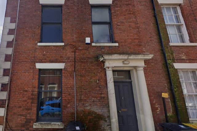 It might not look like it at the moment, but this Latham Street terrace is listed (image: Google)