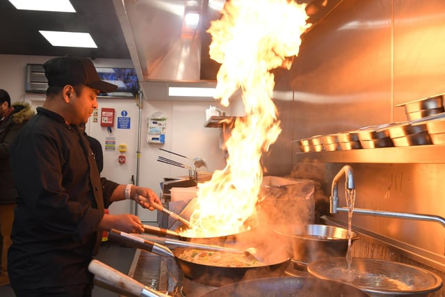 It's hot in the kitchen. Staff hard at work at Oodles Preston