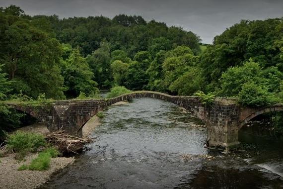 Built in 1562, the bridge is said to be in "very bad" condition. The bridge is being damaged by sapling and tree growth, there is failing consolidant mortar to the surface, and missing stones are allowing vegetation to become established and rain entry.