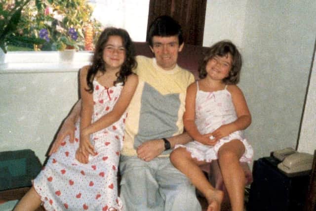 Elizabeth MacRae and her young sister Kirsty with her father Peter MacRae who died after he was given contaminated blood