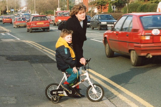 Resident Susan Burgess attempts to cross Garstang Road with her son Jamie. She said the alterations in 1994 made the road more dangerous than it was before