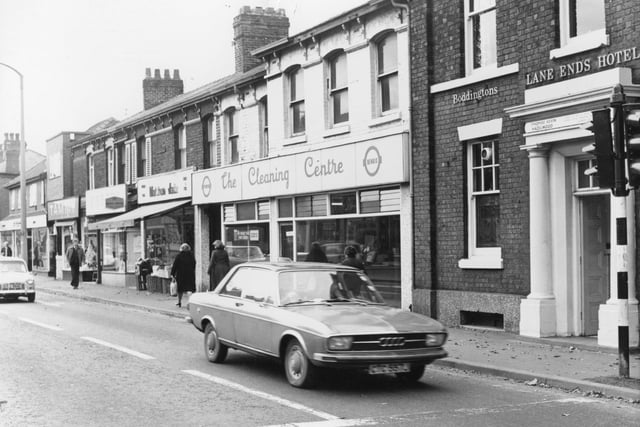 The pub at the crossroads of Lane Ends has seen many shops down the years, and here it stands next to a launderette in 1976