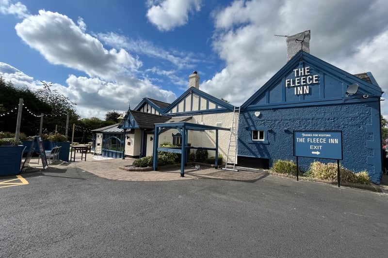 The iconic pub now has a blue and cream exterior