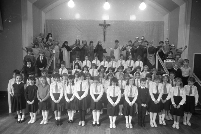 A group of Lancashire school children will make their screen debut when the BBC films their special Easter service. The pupils of St Mary and St Benedict's school in Bamber Bridge are to present a Passion service on Good Friday and, as they do, the cameras will be rolling. Pictured above, some of the cast rehearse