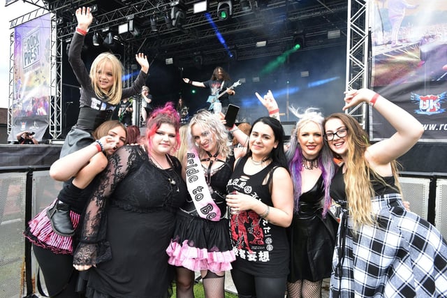 Bride to be, Amy Robinson and her hen party watch Slayer tribute band, South of Heaven perform on the Main Stage at Rock Prest, Moor Park, Preston.