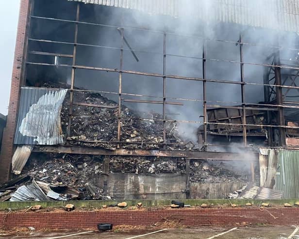 The scene of the large fire in Lancaster which involved 30,000 tonnes of industrial waste. Pockets of fire are still being uncovered at the site by waste removal teams.