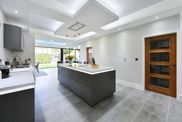 Modern open-plan mansion with home bar, games room, gym, and huge