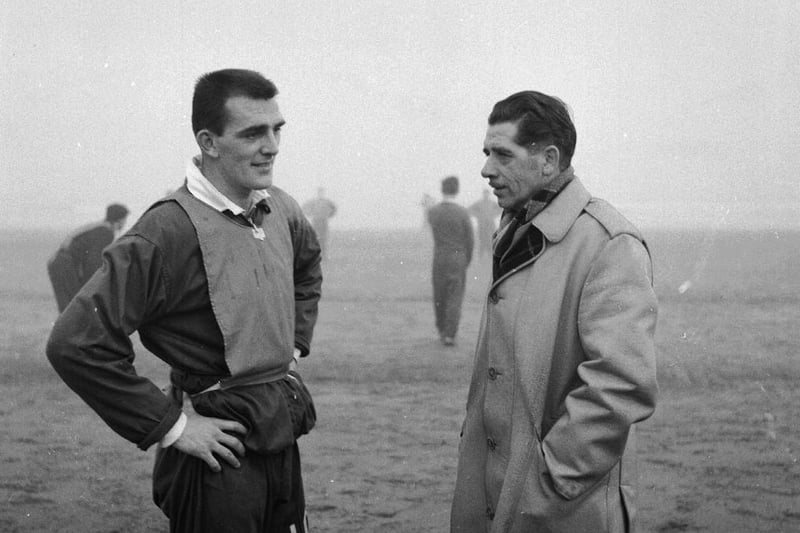 Tommy Leishman chats to manager Walter Galbraith during a training session in January 1963