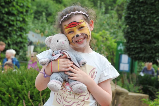 Annabeth Churchhall, eight, has fun at the flower show.