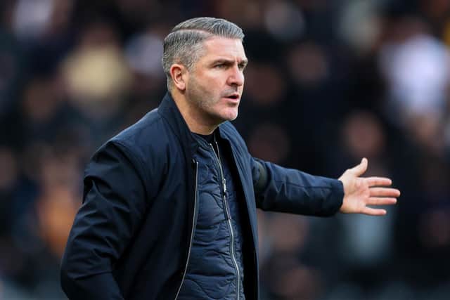 Preston North End manager Ryan Lowe shouts instructions to his team from the technical area