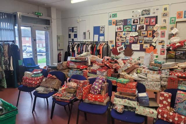 The mound of presents wrapped at The Base last year. Photo:  Progress Housing Group