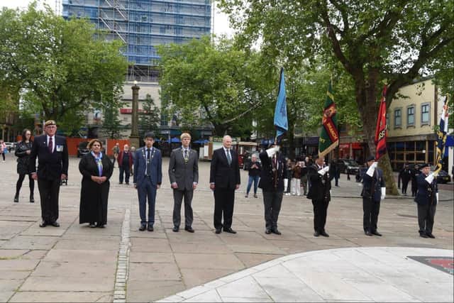 Armed forces and civic leaders mark the 40th anniversary.
