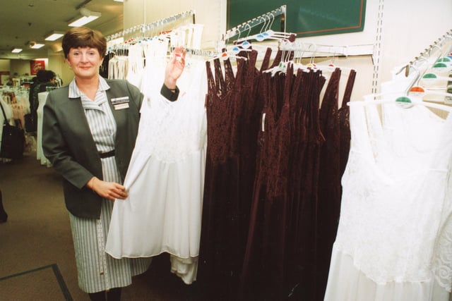 Joan Hough hard at work in the lingerie department during the Christmas rush of 1993