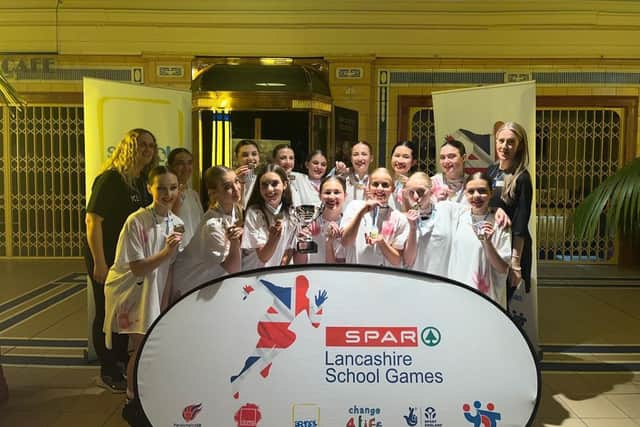 The team from Hodgson Academy with their trophy