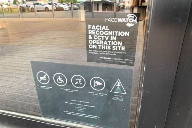 A sign warning customers the Flannels store in Preston's Deepdale Retail Park is using facial recognition technology