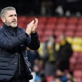 Preston North End's manager Ryan Lowe applauds his side's travelling supporters at the end of the match against Watford