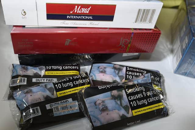 Illicit cigarettes and counterfeit goods seized as part of Trading Standards raids on shops.