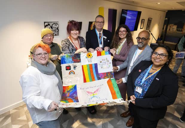(L-R) Arists Pixie and Leigh Willow, artist and UCLan student Emma Preston, UCLan Pro Vice-Chancellor and Vice Chancellor's Group LGBTQ+ ally Professor StJohn Crean, Beth Meadows, Support worker from Lancashire LGBTQ+, Direstcor of EDI at UCLan Pradeep Passi and UCLan EDI STaff Development and Inclusive Culture Officer Suely Ludgero-Newlove.