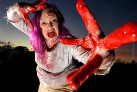 Em Peterson playing the creature in the attic at Scare Kingdom