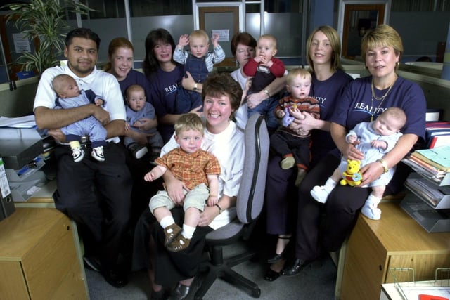 Reality former and present team managers who have sat on a so-called "fertility" chair 101 at the call centre on London Road, Preston, and have had babies - from left, Shahid Hussain and Ishmail, Dawn Lang and Ben, Juliet Fegan and Matthew, grandmother Sandra Harvey and Kian, Jackie Bailey and Ryan, Mandie Jessop and Sophie, and centre Diane Gee and James