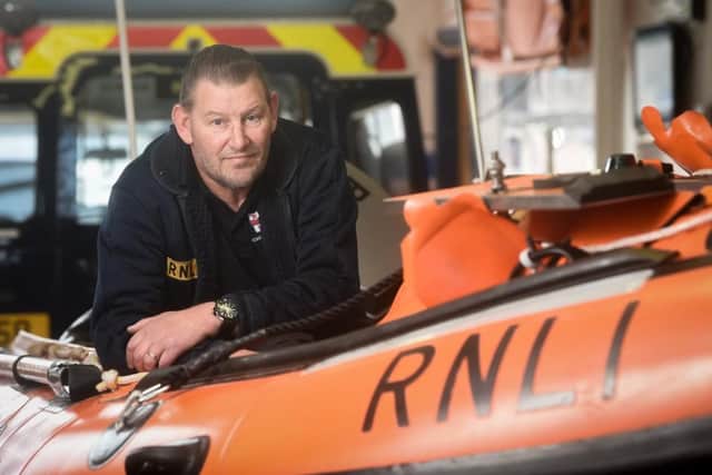 Stewart is still messing about with boats in his job repairing lifeboats for the RNLI.